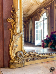Lynnewood Hall Reception Detail, elaborate gilding frames mirror reflecting back a view of the Reception Room.